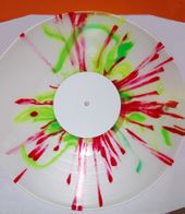 LOTK Clear Red Green Splattered Vinyl.jpg